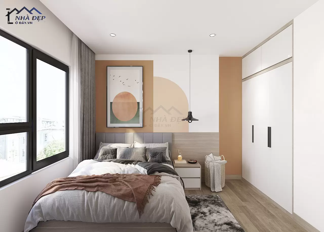 Sơn nhấn và tranh treo tường tạo điểm nhấn cho phòng ngủ